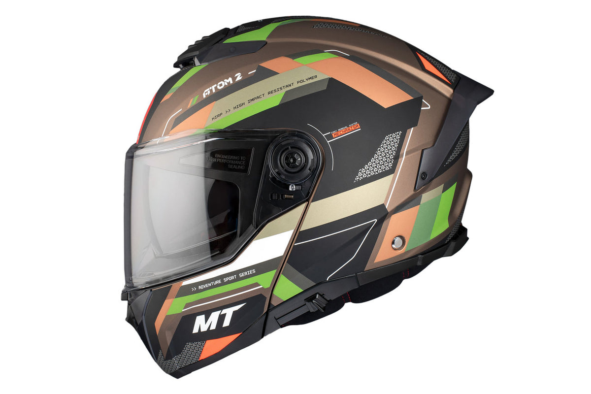 MT Helmets öppningsbar mc-hjälm Atom 2 SV Blast A6 med modern design i gröna, orange och bruna nyanser, visir och ventilation.